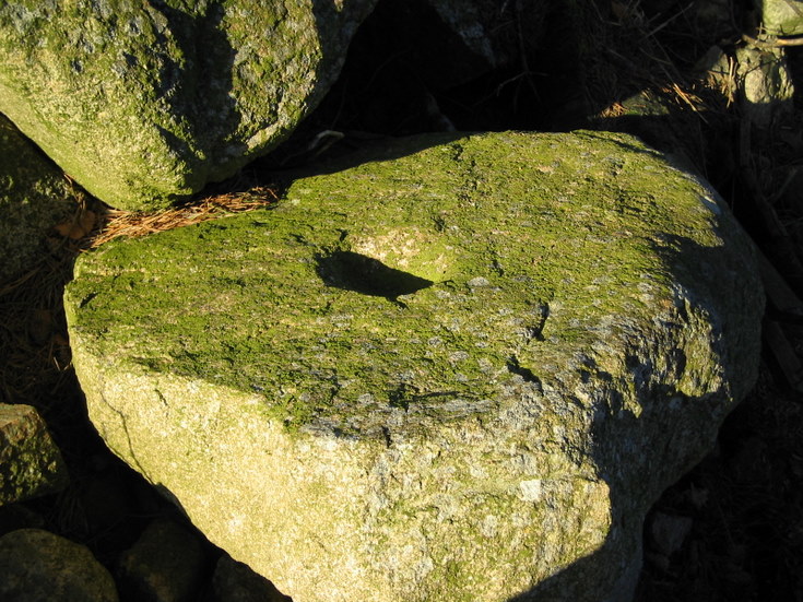 A cup marked stone?